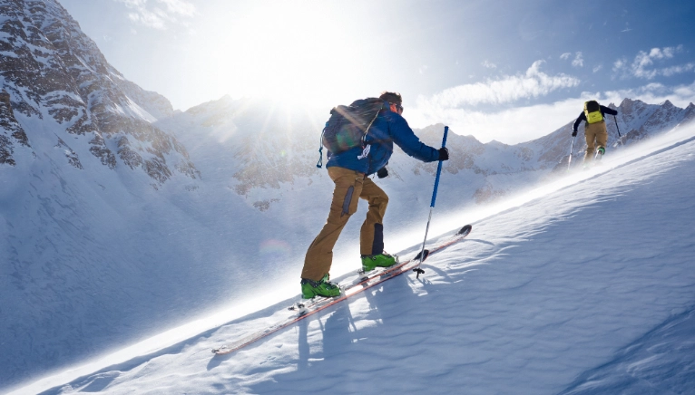 cross country skiing vs ski touring