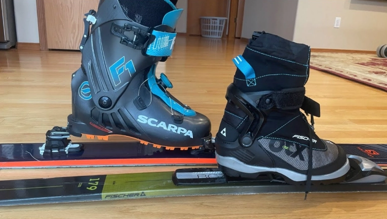 difference between ski touring and cross country skiing